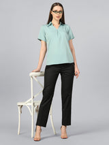 Light blue regular crepe top styled with black trousers and heels.