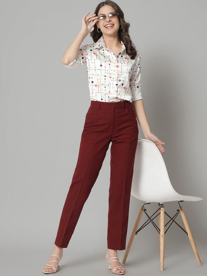 Regular fit mid waist tweed trouser in red, styled with a printed shirt.