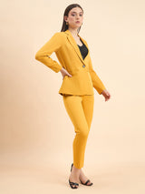 Women's formal pant suit in mustard yellow for professional attire.