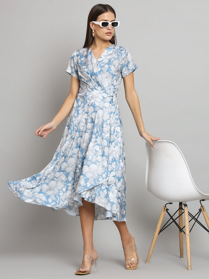 Printed wrap-around dress in blue and grey floral pattern.