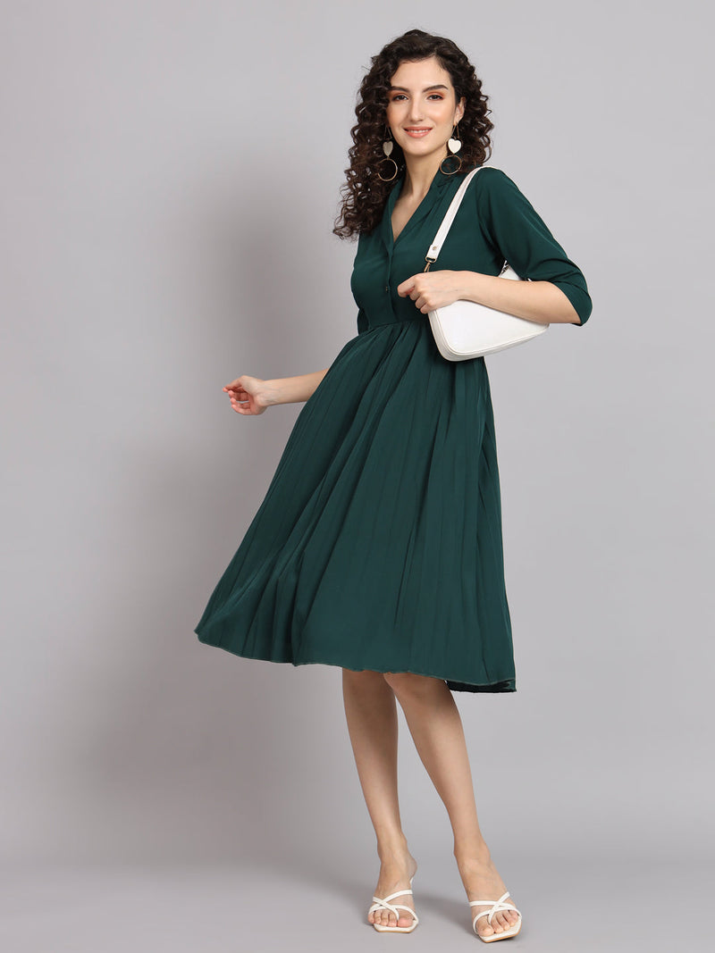 Pleated flare dress in bottle green for stylish women.