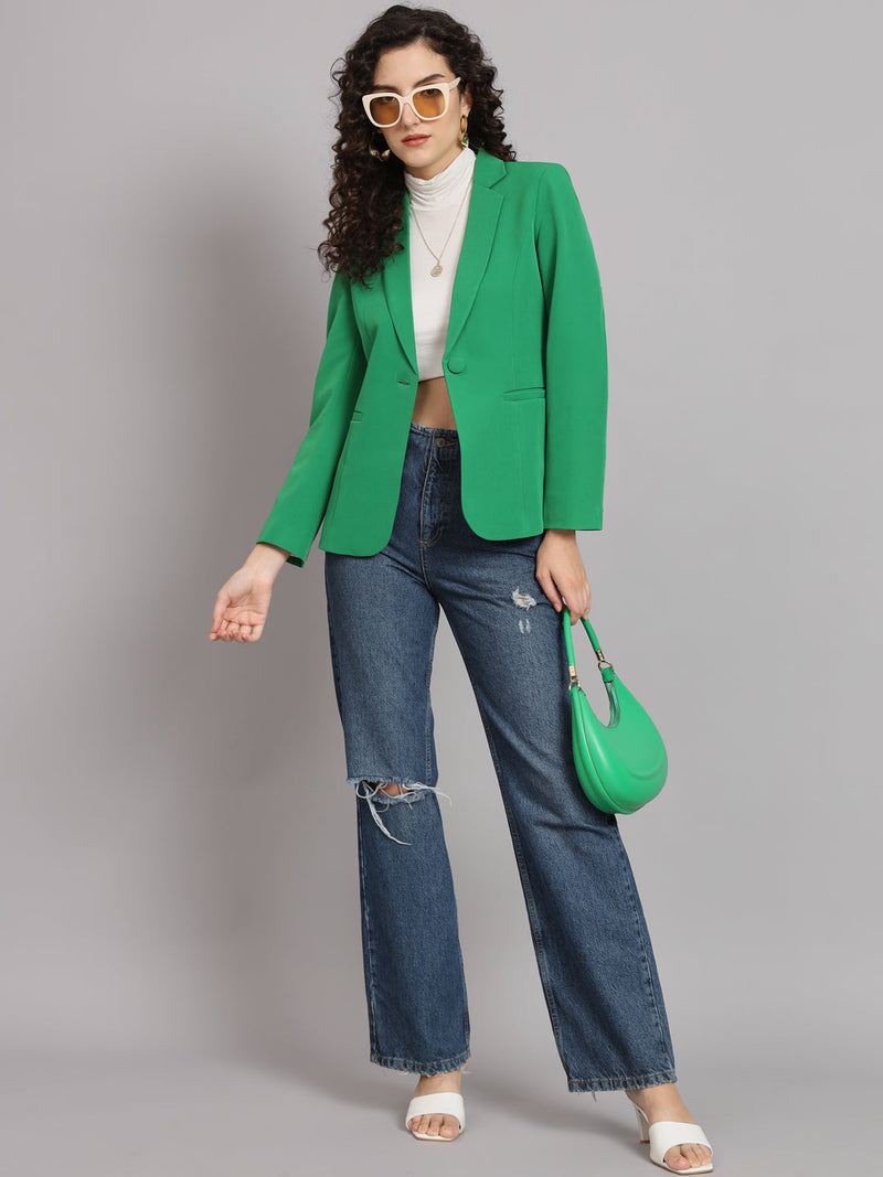 Model wearing a parrot green notched collar blazer with jeans.