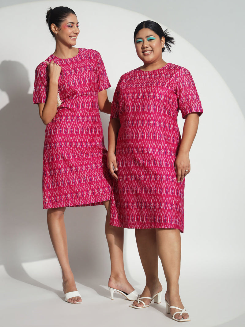 A Line Cotton Printed Dress in vibrant pink worn by two models.