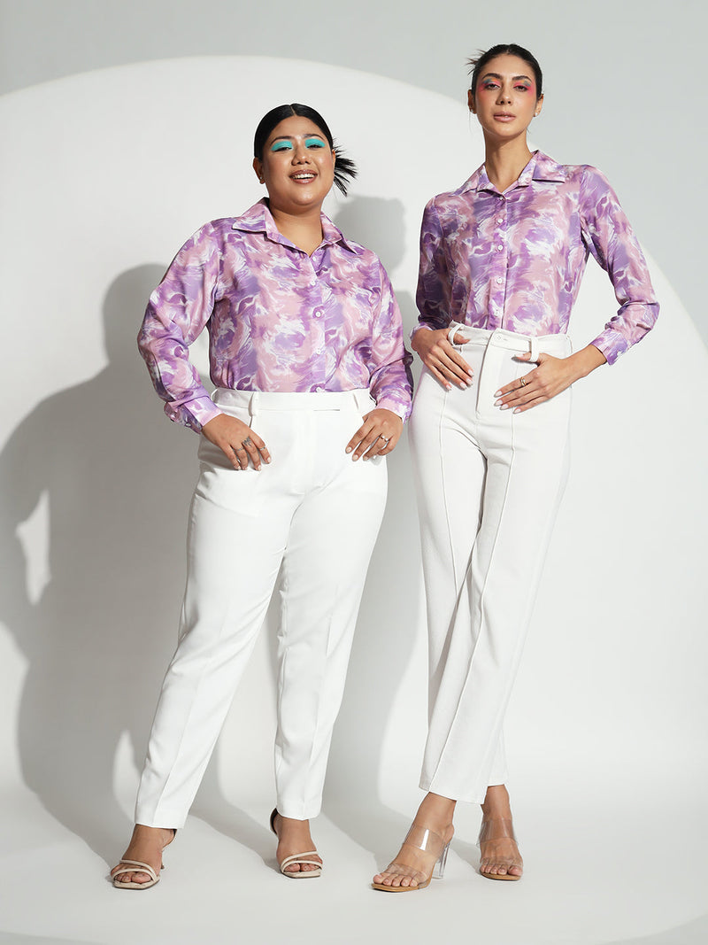 Lavender marble printed shirt worn by two models in stylish outfits.