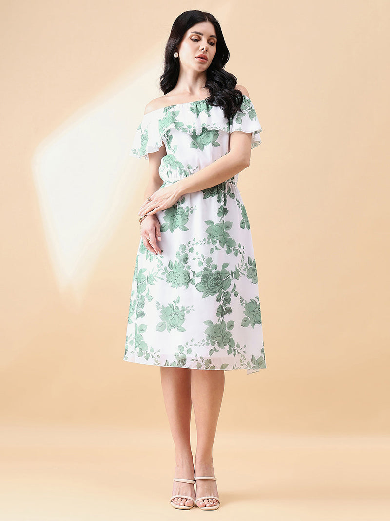 Frill floral dress in green and white on a model.