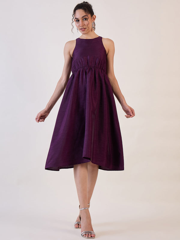 Purple box back fit and flare dress for stylish occasions.