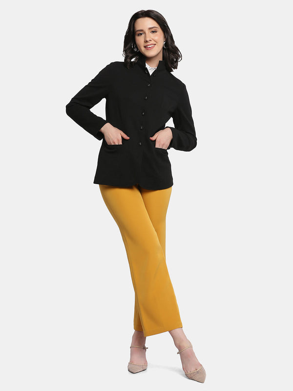 Stretch Knit Casual Jacket in black, stylishly paired with mustard pants.