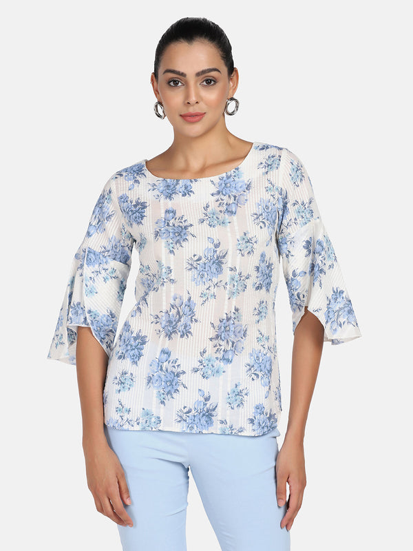 Cotton printed blue and white floral top for women.