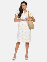 Floral print white and yellow rayon A-line dress for women.