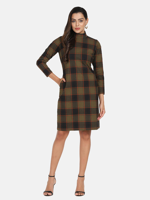 Warm brown checkered tweed dress with three-quarter sleeves and pockets.