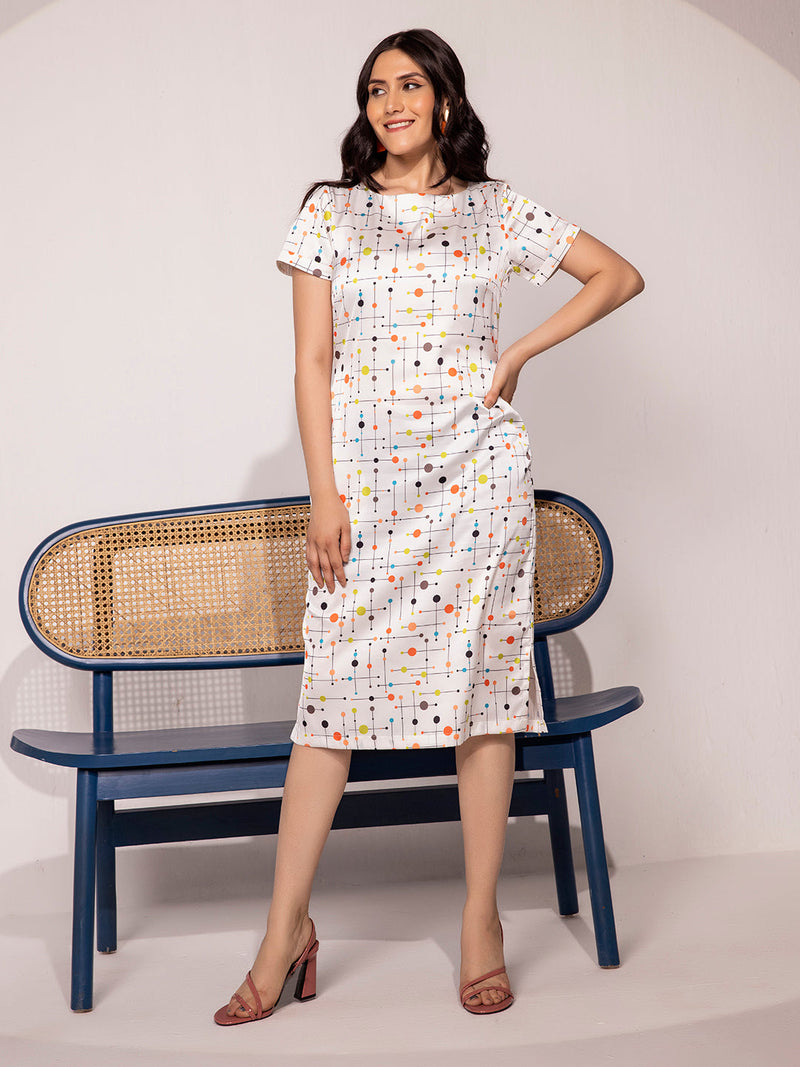 Printed sheath dress in white with colorful polka dots, stylish summer outfit.